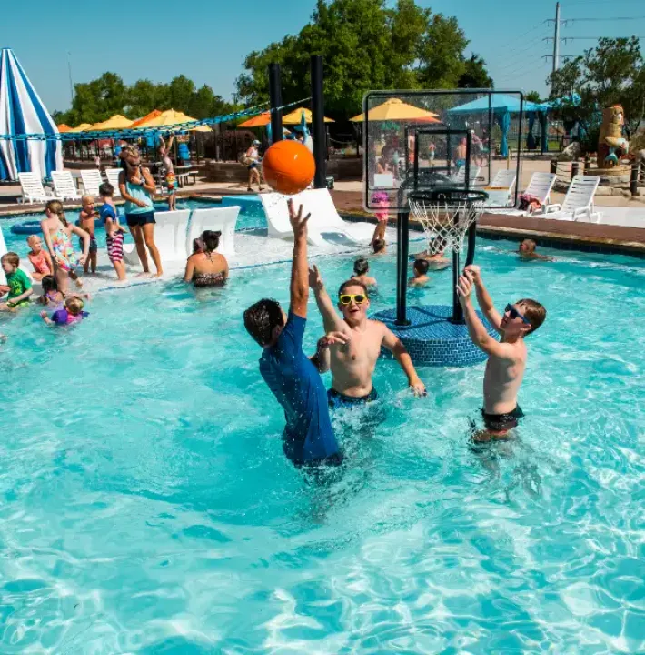 Kids playing in water at Mansfield park