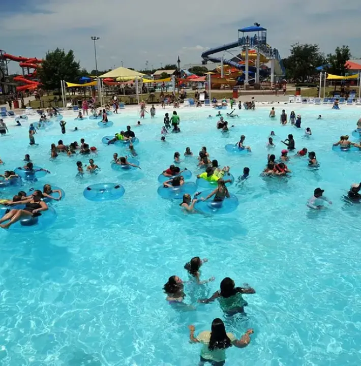 Kids playing in water at Mansfield park